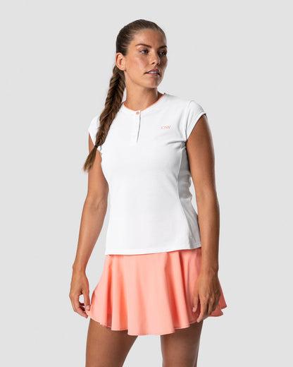 training pique polo white/coral wmn